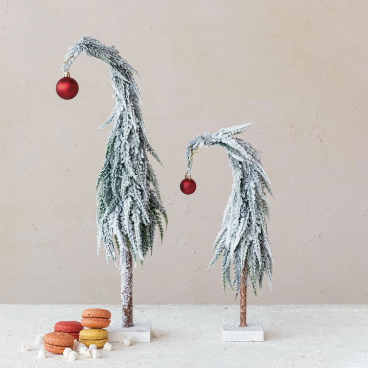 Leaning Evergreen w/ Red Ball Ornament